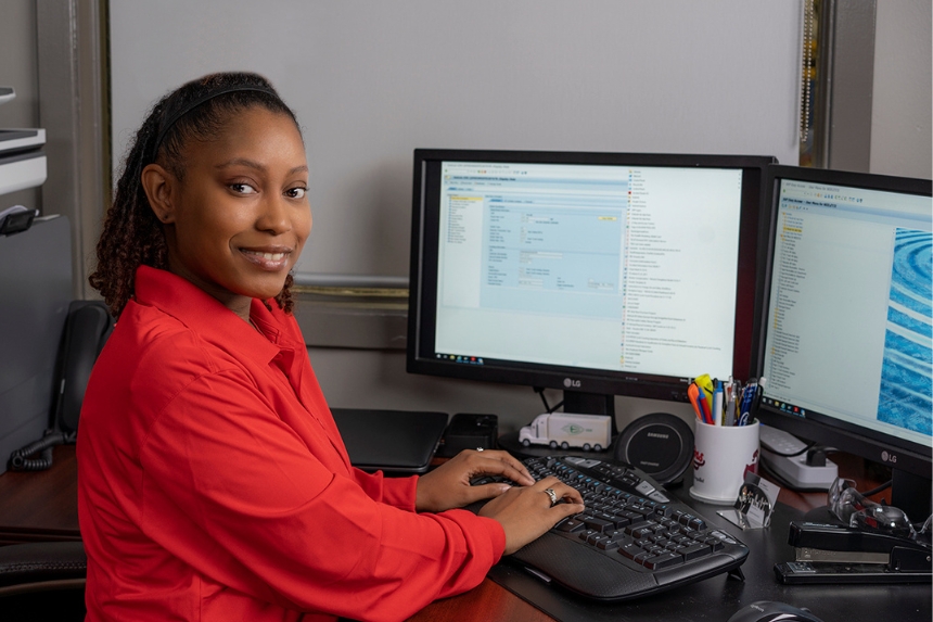 Rush Truck Leasing employee working on computer